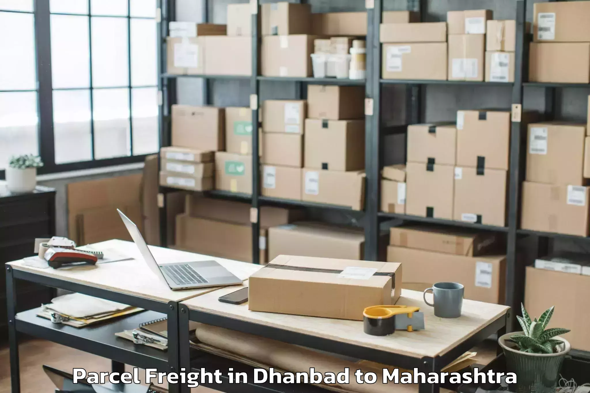 Trusted Dhanbad to Sakharkherda Parcel Freight